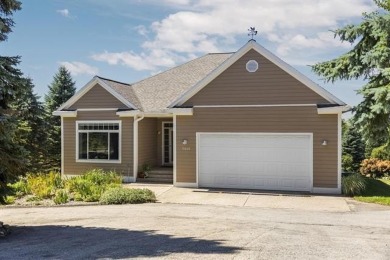 Welcome to your dream retreat at 5668 Golf Meadows Drive in on Shanty Creek Golf Course in Michigan - for sale on GolfHomes.com, golf home, golf lot