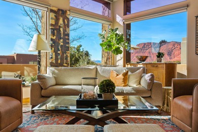 This gorgeous home blends indoors and outdoors with the many on Entrada at Snow Canyon in Utah - for sale on GolfHomes.com, golf home, golf lot