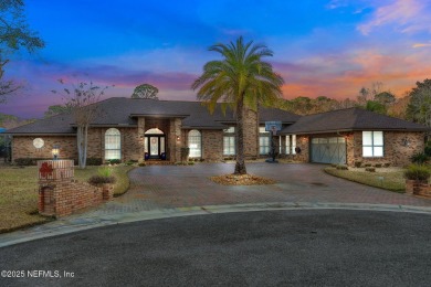 Gorgeousl all brick home sits on estate lot that is located in on Magnolia Point Golf and Country Club in Florida - for sale on GolfHomes.com, golf home, golf lot