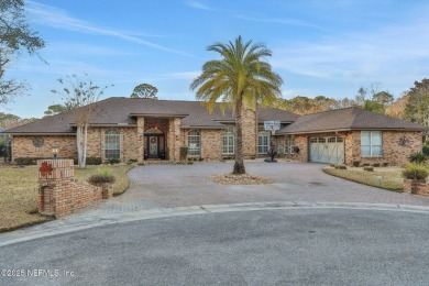 Gorgeousl all brick home sits on estate lot that is located in on Magnolia Point Golf and Country Club in Florida - for sale on GolfHomes.com, golf home, golf lot