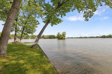 Comfortable and welcoming with 260 feet of water frontage, and on Island Hills Golf Club in Michigan - for sale on GolfHomes.com, golf home, golf lot