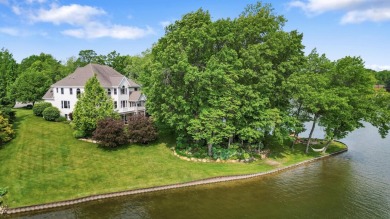 Comfortable and welcoming with 260 feet of water frontage, and on Island Hills Golf Club in Michigan - for sale on GolfHomes.com, golf home, golf lot