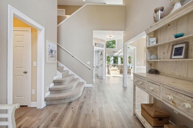 Comfortable and welcoming with 260 feet of water frontage, and on Island Hills Golf Club in Michigan - for sale on GolfHomes.com, golf home, golf lot