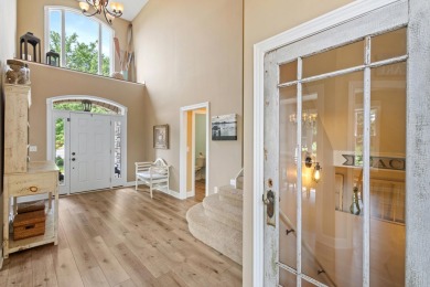 Comfortable and welcoming with 260 feet of water frontage, and on Island Hills Golf Club in Michigan - for sale on GolfHomes.com, golf home, golf lot