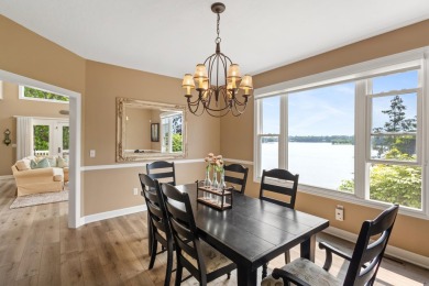 Comfortable and welcoming with 260 feet of water frontage, and on Island Hills Golf Club in Michigan - for sale on GolfHomes.com, golf home, golf lot