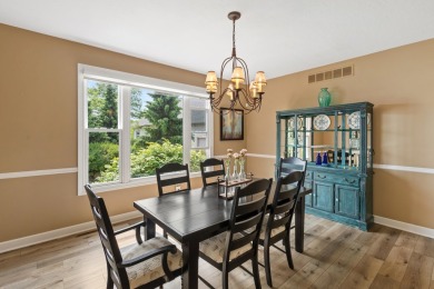 Comfortable and welcoming with 260 feet of water frontage, and on Island Hills Golf Club in Michigan - for sale on GolfHomes.com, golf home, golf lot