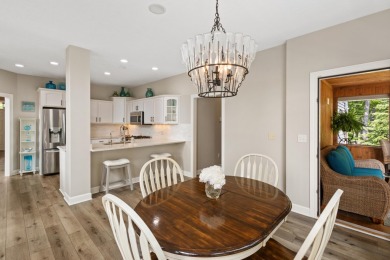 Comfortable and welcoming with 260 feet of water frontage, and on Island Hills Golf Club in Michigan - for sale on GolfHomes.com, golf home, golf lot