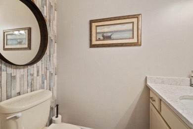Comfortable and welcoming with 260 feet of water frontage, and on Island Hills Golf Club in Michigan - for sale on GolfHomes.com, golf home, golf lot