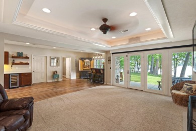 Comfortable and welcoming with 260 feet of water frontage, and on Island Hills Golf Club in Michigan - for sale on GolfHomes.com, golf home, golf lot
