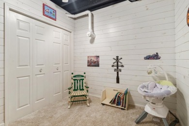 Comfortable and welcoming with 260 feet of water frontage, and on Island Hills Golf Club in Michigan - for sale on GolfHomes.com, golf home, golf lot