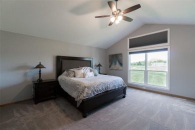 This beautiful 2-story home overlooks the par-3 4th hole at on Hunters Ridge Golf Course in Iowa - for sale on GolfHomes.com, golf home, golf lot
