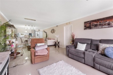 Beautifully renovated apartment seamlessly blends modern designs on Sunrise Lakes Phase IV Golf Course in Florida - for sale on GolfHomes.com, golf home, golf lot