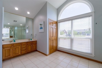 This beautiful 2-story home overlooks the par-3 4th hole at on Hunters Ridge Golf Course in Iowa - for sale on GolfHomes.com, golf home, golf lot