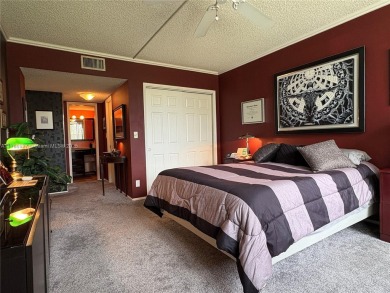 BEAUTIFUL GOLF COURSE VIEWS provide a serene environment for on Palm-Aire Country Club and Resort - Palms in Florida - for sale on GolfHomes.com, golf home, golf lot