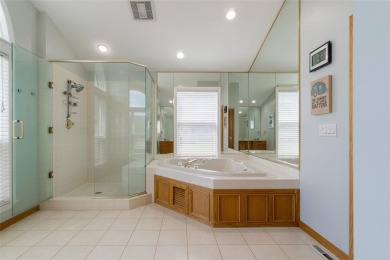 This beautiful 2-story home overlooks the par-3 4th hole at on Hunters Ridge Golf Course in Iowa - for sale on GolfHomes.com, golf home, golf lot