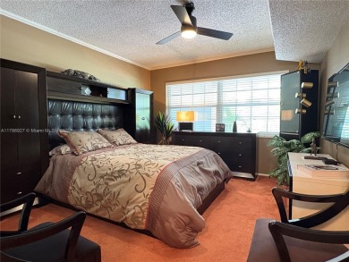 BEAUTIFUL GOLF COURSE VIEWS provide a serene environment for on Palm-Aire Country Club and Resort - Palms in Florida - for sale on GolfHomes.com, golf home, golf lot
