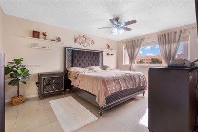 Beautifully renovated apartment seamlessly blends modern designs on Sunrise Lakes Phase IV Golf Course in Florida - for sale on GolfHomes.com, golf home, golf lot