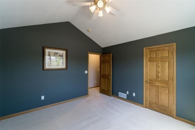 This beautiful 2-story home overlooks the par-3 4th hole at on Hunters Ridge Golf Course in Iowa - for sale on GolfHomes.com, golf home, golf lot