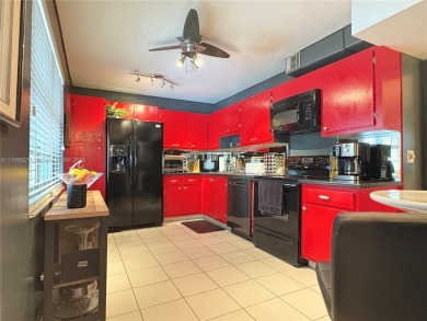 BEAUTIFUL GOLF COURSE VIEWS provide a serene environment for on Palm-Aire Country Club and Resort - Palms in Florida - for sale on GolfHomes.com, golf home, golf lot