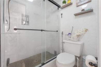 Beautifully renovated apartment seamlessly blends modern designs on Sunrise Lakes Phase IV Golf Course in Florida - for sale on GolfHomes.com, golf home, golf lot