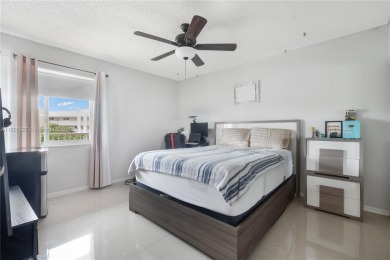 Beautifully renovated apartment seamlessly blends modern designs on Sunrise Lakes Phase IV Golf Course in Florida - for sale on GolfHomes.com, golf home, golf lot