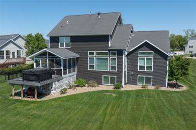 This beautiful 2-story home overlooks the par-3 4th hole at on Hunters Ridge Golf Course in Iowa - for sale on GolfHomes.com, golf home, golf lot