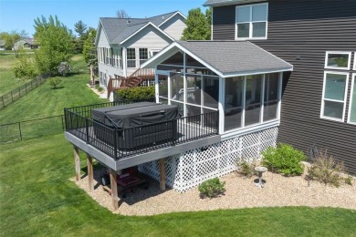 This beautiful 2-story home overlooks the par-3 4th hole at on Hunters Ridge Golf Course in Iowa - for sale on GolfHomes.com, golf home, golf lot