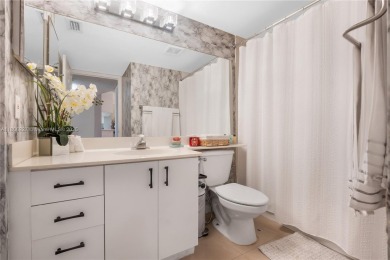 Beautifully renovated apartment seamlessly blends modern designs on Sunrise Lakes Phase IV Golf Course in Florida - for sale on GolfHomes.com, golf home, golf lot