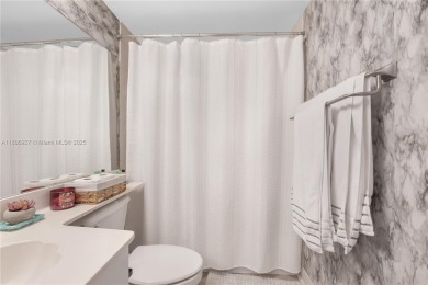 Beautifully renovated apartment seamlessly blends modern designs on Sunrise Lakes Phase IV Golf Course in Florida - for sale on GolfHomes.com, golf home, golf lot