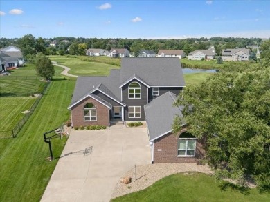 This beautiful 2-story home overlooks the par-3 4th hole at on Hunters Ridge Golf Course in Iowa - for sale on GolfHomes.com, golf home, golf lot