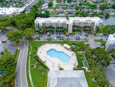 Beautifully renovated apartment seamlessly blends modern designs on Sunrise Lakes Phase IV Golf Course in Florida - for sale on GolfHomes.com, golf home, golf lot