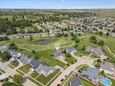 This beautiful 2-story home overlooks the par-3 4th hole at on Hunters Ridge Golf Course in Iowa - for sale on GolfHomes.com, golf home, golf lot