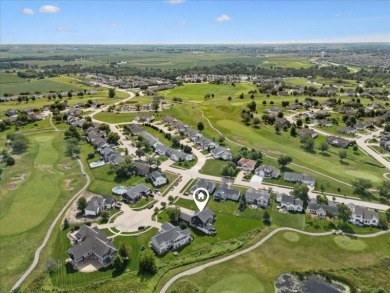 This beautiful 2-story home overlooks the par-3 4th hole at on Hunters Ridge Golf Course in Iowa - for sale on GolfHomes.com, golf home, golf lot