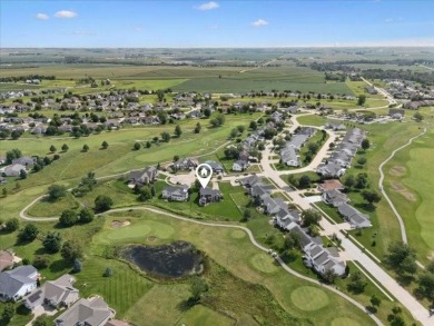 This beautiful 2-story home overlooks the par-3 4th hole at on Hunters Ridge Golf Course in Iowa - for sale on GolfHomes.com, golf home, golf lot