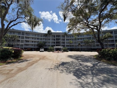 BEAUTIFUL GOLF COURSE VIEWS provide a serene environment for on Palm-Aire Country Club and Resort - Palms in Florida - for sale on GolfHomes.com, golf home, golf lot