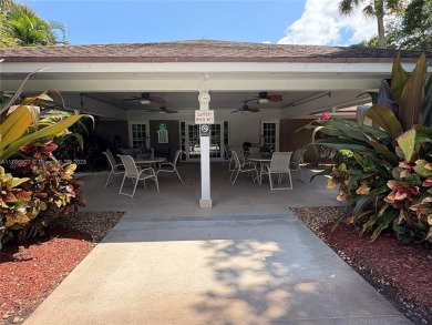 BEAUTIFUL GOLF COURSE VIEWS provide a serene environment for on Palm-Aire Country Club and Resort - Palms in Florida - for sale on GolfHomes.com, golf home, golf lot