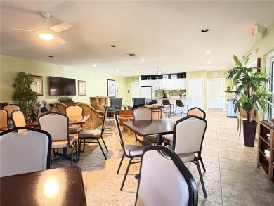 BEAUTIFUL GOLF COURSE VIEWS provide a serene environment for on Palm-Aire Country Club and Resort - Palms in Florida - for sale on GolfHomes.com, golf home, golf lot