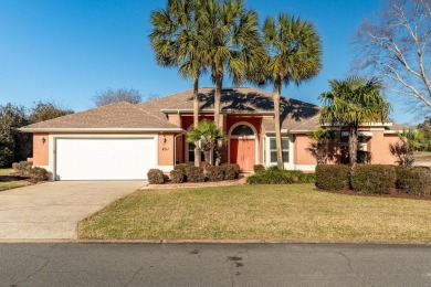 Nestled on the serene Shalimar Pointe Golf Course, this stunning on Shalimar Pointe Golf and Country Club in Florida - for sale on GolfHomes.com, golf home, golf lot