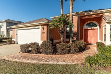 Nestled on the serene Shalimar Pointe Golf Course, this stunning on Shalimar Pointe Golf and Country Club in Florida - for sale on GolfHomes.com, golf home, golf lot