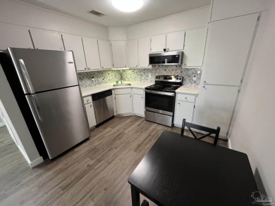 Turn key 2 bedroom, one bath condo in terrific Gulf Breeze on Tiger Point Golf and Country Club in Florida - for sale on GolfHomes.com, golf home, golf lot