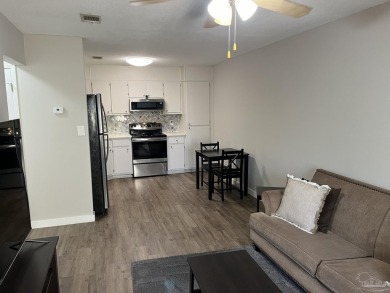 Turn key 2 bedroom, one bath condo in terrific Gulf Breeze on Tiger Point Golf and Country Club in Florida - for sale on GolfHomes.com, golf home, golf lot