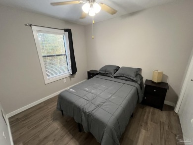 Turn key 2 bedroom, one bath condo in terrific Gulf Breeze on Tiger Point Golf and Country Club in Florida - for sale on GolfHomes.com, golf home, golf lot