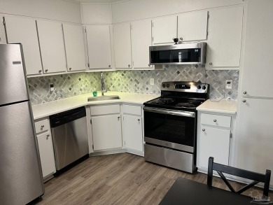 Turn key 2 bedroom, one bath condo in terrific Gulf Breeze on Tiger Point Golf and Country Club in Florida - for sale on GolfHomes.com, golf home, golf lot