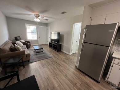 Turn key 2 bedroom, one bath condo in terrific Gulf Breeze on Tiger Point Golf and Country Club in Florida - for sale on GolfHomes.com, golf home, golf lot