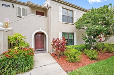 Charming and quiet 2-bedroom, 2-bath condo overlooking lush on Feather Sound Country Club in Florida - for sale on GolfHomes.com, golf home, golf lot