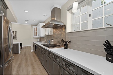 This modern hillside residence in Woodland Hills offers 4 on Woodland Hills Country Club in California - for sale on GolfHomes.com, golf home, golf lot