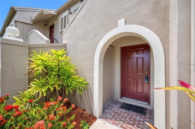 Charming and quiet 2-bedroom, 2-bath condo overlooking lush on Feather Sound Country Club in Florida - for sale on GolfHomes.com, golf home, golf lot