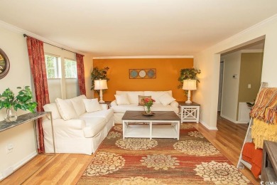 Just a short golf cart ride away from beautiful Garden City on Indigo Creek Golf Club in South Carolina - for sale on GolfHomes.com, golf home, golf lot