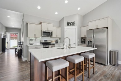 This beautiful Eco friendly ranch home features an inviting open on Woodland Hills Golf in Iowa - for sale on GolfHomes.com, golf home, golf lot