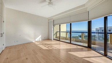 Indulge in spectacular, fully reimagined waterfront living in on Longboat Key Golf Club Resort in Florida - for sale on GolfHomes.com, golf home, golf lot